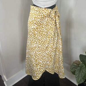 Fun wrap around silk yellow skirt with floral.